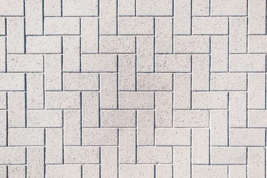 monochrom rectangle geometric pattern gray textured masonry. pavers. Horizontal orientetion. flat lay.