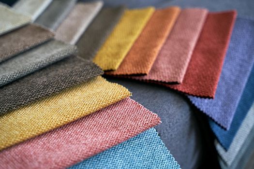 Colorful upholstery fabric samples in different colors