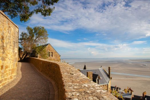 Promenade along the walls,Mont Saint Michel, Brittany, France. The Mont-Saint-Michel is one of Europe's most unforgettable sights.
