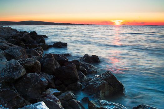 Rocky coastline and blue sky on island Vir, Croatia. Evening sunset with pastel colours of sky.