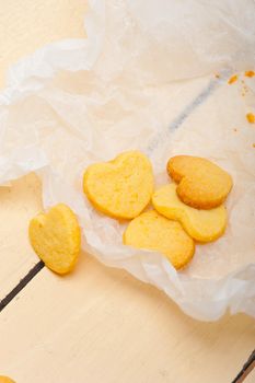 fresh baked heart shaped shortbread valentine day cookies on a paper wrap