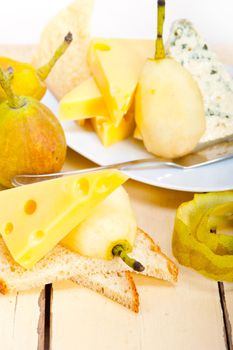 selection of cheese and fresh pears appetizer snack