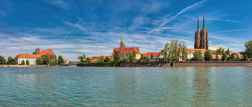 Wroclaw Old Town. Cathedral Island (Ostrow Tumski) is the oldest part of the city. Cathedral of St. John and Blessed Virgin Mary Church and Odra (Oder) river.