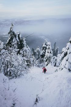 Winter Steep Slope Path Down the Mountain with Snow and person. High quality photo