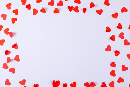 Overhead view of heart shaped decoration with copy space against white background. valentine's day and love concept.