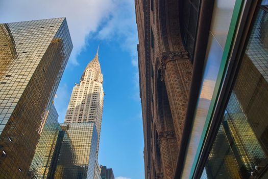 Skyline of midtown Manhattan in New York City with landmark skyscraper Chrysler Building