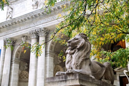 New York, NY, USA - October 14, 2017: Lion sculpture at the steps of New York Public Library - Stephen A. Schwarzman Building on 5th Avenue