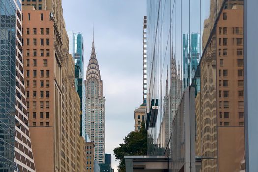 Skyline of midtown Manhattan in New York City with landmark skyscraper Chrysler Building