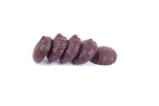 marshmallow coated with chocolate in a row, closeup
