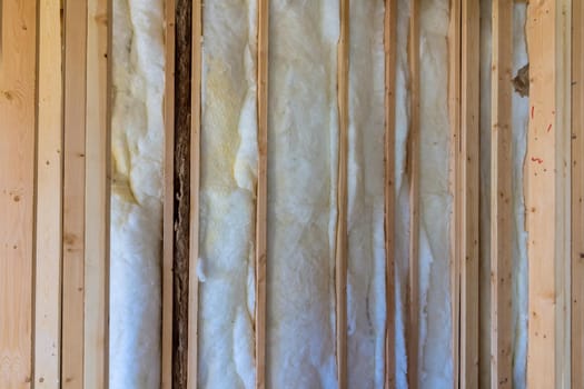 House thermal insulation with mineral wool for wall covering