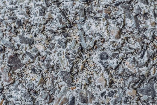 Abstract real photo grunge background. Light Grey gravel concrete asphalt road macro close up texture surface shot. Design, wall decorative trim.