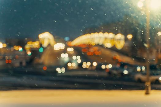 blurred background. road traffic in big city at winter night