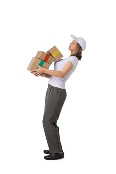 Full length portrait of delivery woman in white cap, t-shirt giving order boxes isolated on white background. Female courier step, cardboard box. Receiving package.