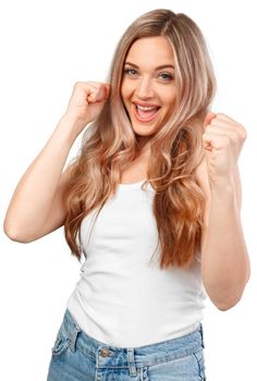 Young casual woman over isolated white background celebrating a victory, portrait