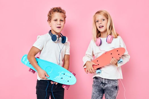 Children riding skateboard skateboards in the hands of entertainment active lifestyle childhood. High quality photo