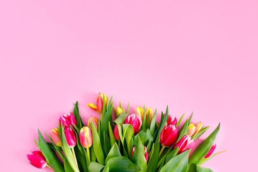 Lovely tulips bunch, floral border. Layout for springtime holidays. Mother day greeting card