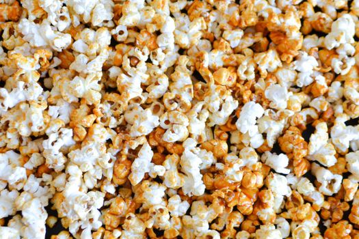 Popcorn texture background. Delicious snack. Butter popcorn is a famous snack. Homemade meal. Popcorn concept. High quality photo