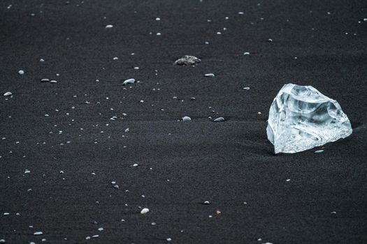 Ice diamond over diamonds beach in Jokulsarlon, Iceland