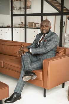 Successful Young Businessman. African American Guy In Stylish Expensive Suit Folded His Palms Together Looking Directly Into Camera. Concept Of Victory, Personal Growth. High quality photo