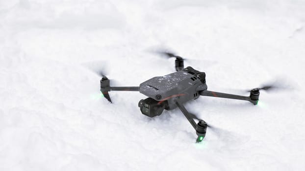 New DJI Mavic 3 on snow, takeoff in snow conditions. DJI Mavic 3 one of the most portable drones in the market, with Hasselblad camera. 25.01.2022 Rostov-on-Don, Russia.
