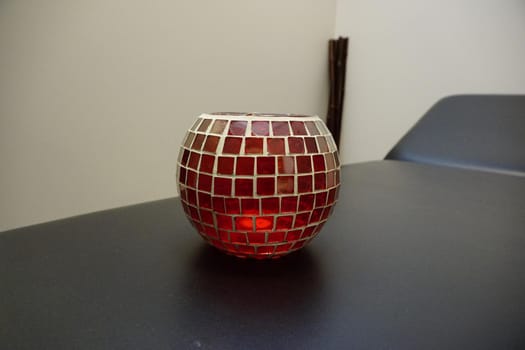 glass sphere decoration covered with red glass mosaic. High quality photo