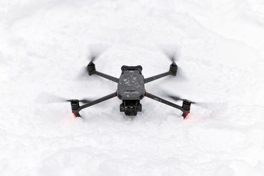 New DJI Mavic 3 on snow, takeoff in snow conditions. DJI Mavic 3 one of the most portable drones in the market, with Hasselblad camera. 25.01.2022 Rostov-on-Don, Russia.