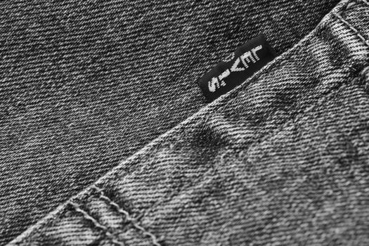 Close up of the details of new LEVI'S 501 Jeans. Seams and denim texture close-up. Classic jeans model. LEVI'S is a brand name of Levi Strauss and Co, founded in 1853. 31.12.2021, Rostov, Russia.