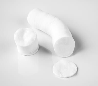 Cotton pads on the white background