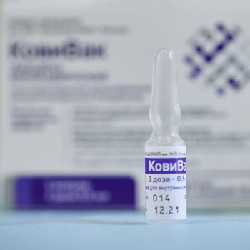 Box and ampoules with new Russian vaccine against coronavirus SARS-CoV-2, CoviVac. CoviVac is developed by the Chumakov Centre. Vaccine for prevention COVID-19. 26.08.2021, Moscow, Russia.