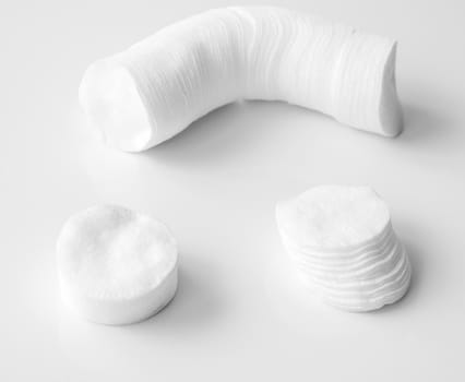 Cotton pads on the white background