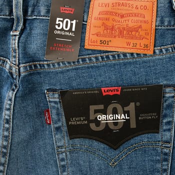 Levi's logo and badges is displayed on Levi Strauss 501 jeans. New LEVI'S 501 Jeans. Classic jeans model. 31.12.2021, Rostov, Russia.