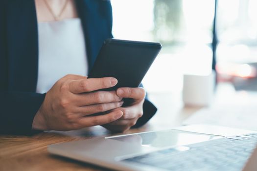 Young man using mobile phone. Using online connect technology for business, education and communication.