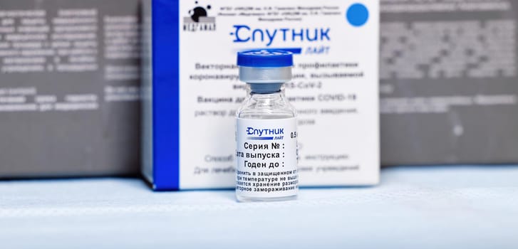 Box and ampoules with new Russian vaccine against coronavirus SARS-CoV-2, Sputnik Lite. Vaccine for prevention COVID-19. 26.08.2021, Moscow, Russia.