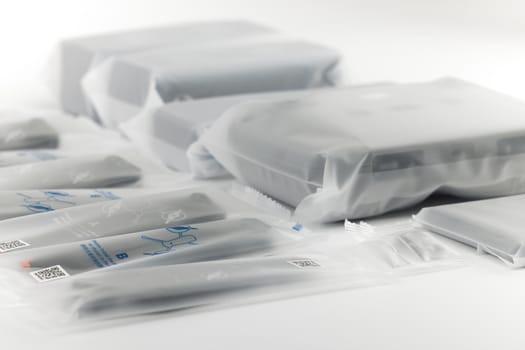 New DJI Mavic 3 drone on a white background when unpacking. Parts of the delivery set in the original packaging. DJI world leader developer and manufacturers in UAV. 17.12.2021, Rostov region, Russia.