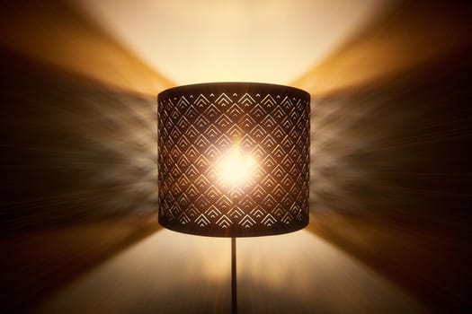 Floor lamp light. Rays of light through the holes in the lamp floor lamp. Bright shining lamp in the night.