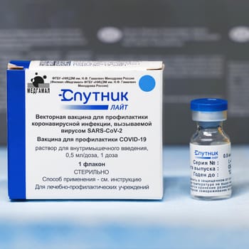 Box and ampoules with new Russian vaccine against coronavirus SARS-CoV-2, Sputnik Lite. Vaccine for prevention COVID-19. 26.08.2021, Moscow, Russia.