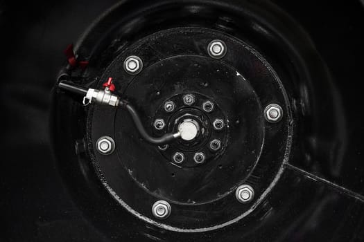 Low pressure tires, with automatic tire pumping system. Extreme patency. Giant Wheels of an all-terrain vehicle. ATV monster car.