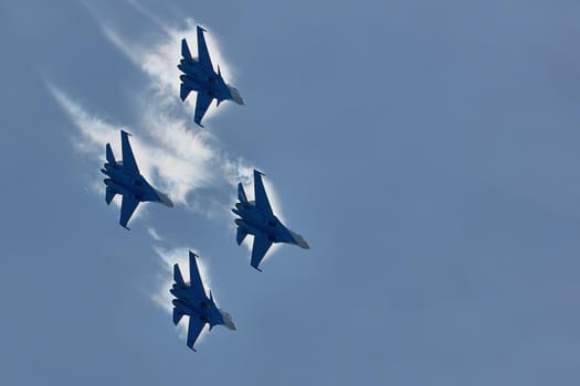 Performance of the aerobatic team Russian Knights, Russian Air Force. On planes Sukhoi Su-30SM, NATO code name: Flanker-C. International Military-Technical Forum Army-2020 . 09.25.2020, Moscow, Russia