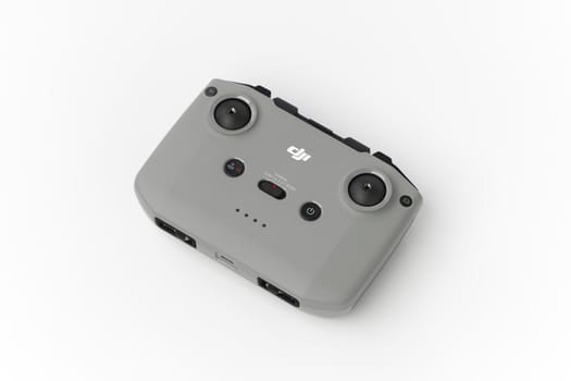 DJI remote control on white background. Control stick of the DJI Mavic 3 drone. Unpacking and configuring the DJI copter. 17.12.2021, Rostov region, Russia.