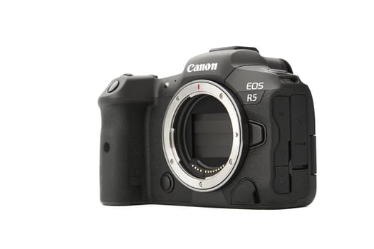 Canon EOS R5 Mirrorless Digital Camera with 8k raw video on a white background. One of the most powerful mirrorless cameras on the market. 03.04.2021, Rostov region, Russia.