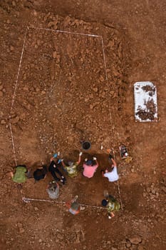 Excavations at the site of a war crime. Site of a mass shooting of people. Human remains (bones of skeleton, skulls). Human remains of victims of the Nazis. 28.08.2021, Rostov region, Russia.