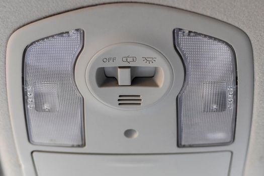 Automobile cabin ceiling lights closeup