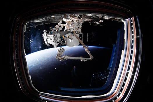 The SpaceX Crew Dragon spacecraft is docked to the International Space Station. Elements of this image furnished by NASA.