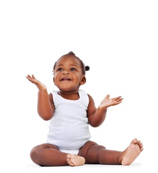 Studio shot of an adorable baby girl isolated on white.