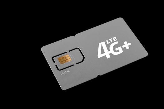 Dimensions of sim cards. Standard, micro and nano SIM card collected in card. SIM card for phone on a black background.