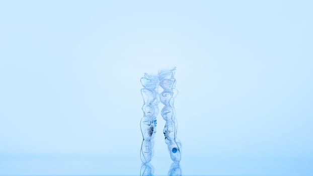 Invisible dental teeth bracket tooth aligners. Invisalign braces. Invisible aligner - Orthodontic temporary removable straighteners.