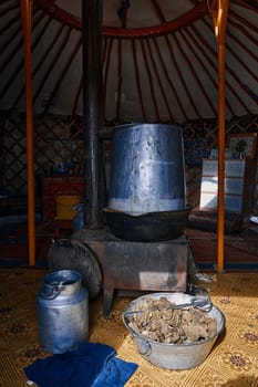 Life of the Mongolian Yurt. Interior of the nomad's house. Mongol family at home. 06.09.2019. Gobi Desert, Mongolia.