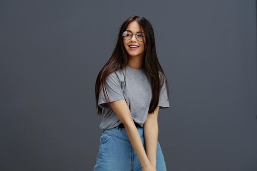 portrait woman glasses on face fashion lifestyle gray t-shirt Lifestyle. High quality photo