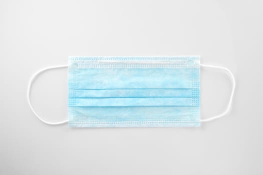 Medical mask, Medical protective mask on white background. Disposable surgical face mask cover the mouth and nose. Healthcare and medical concept.