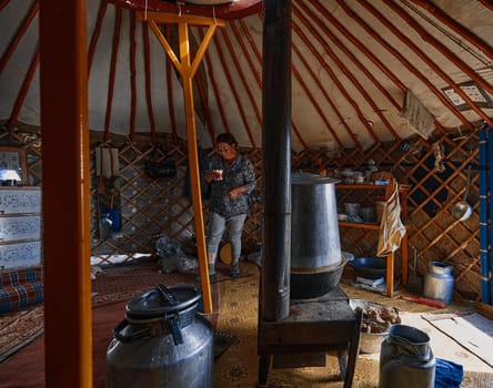 Life of the Mongolian Yurt. Interior of the nomad's house. Mongol family at home. 06.09.2019. Gobi Desert, Mongolia.